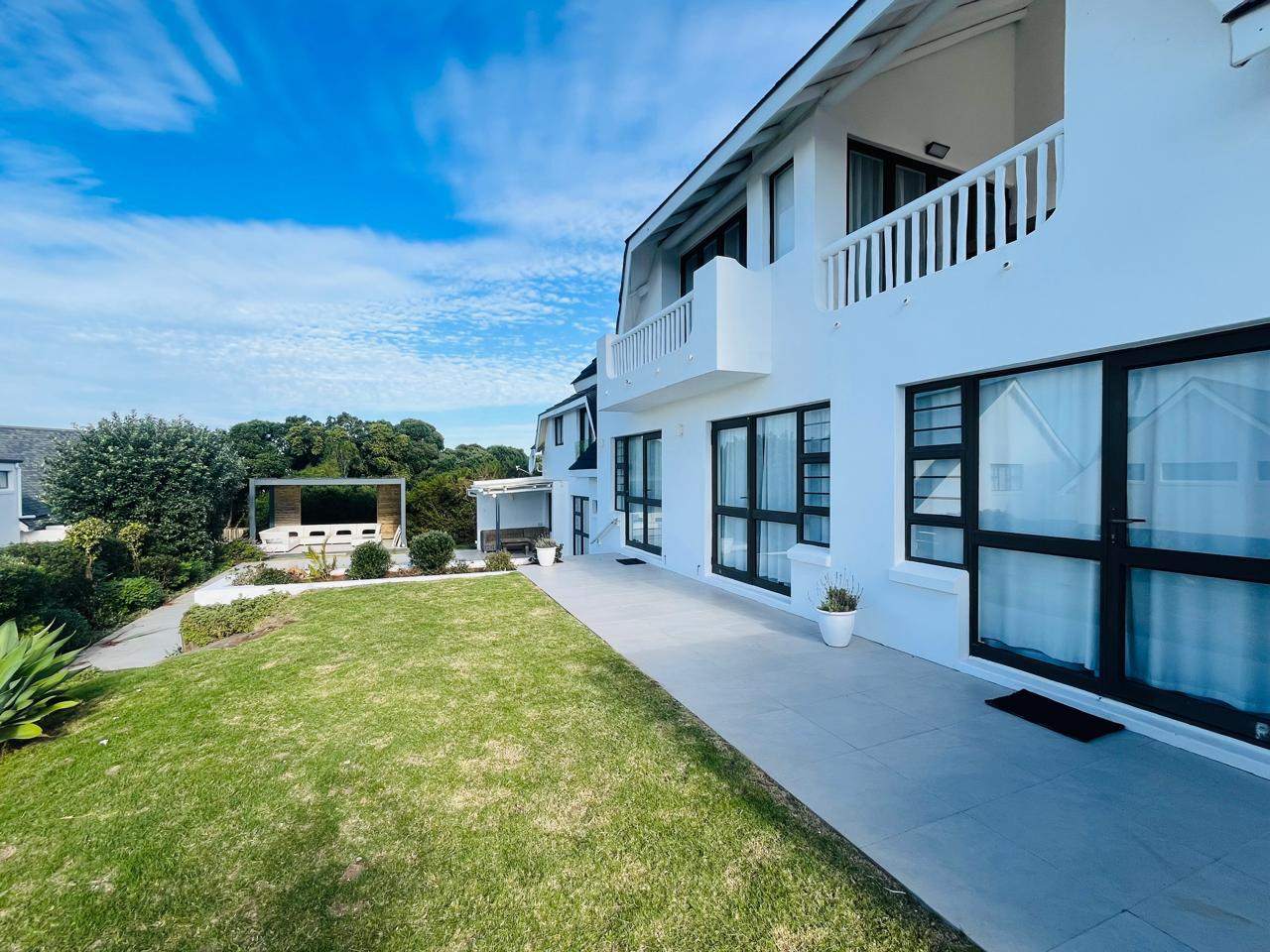 Luxurious 5-Bedroom Beachfront Home with Breathtaking Ocean Views